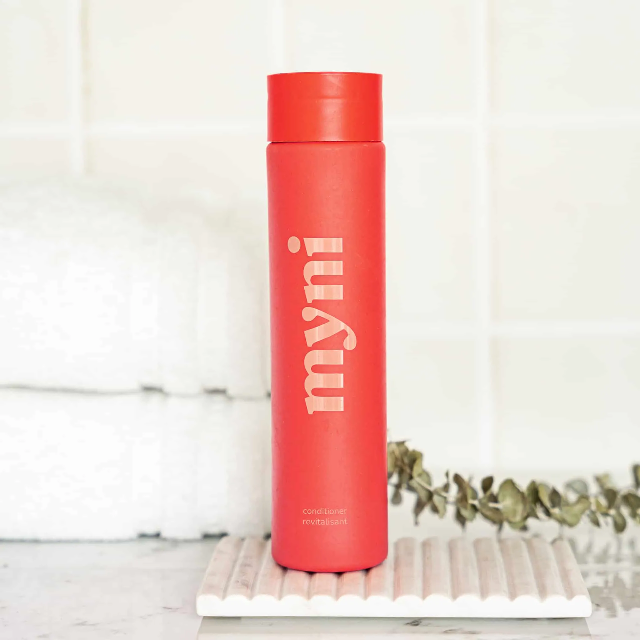 Conditioner bottle in wheat straw