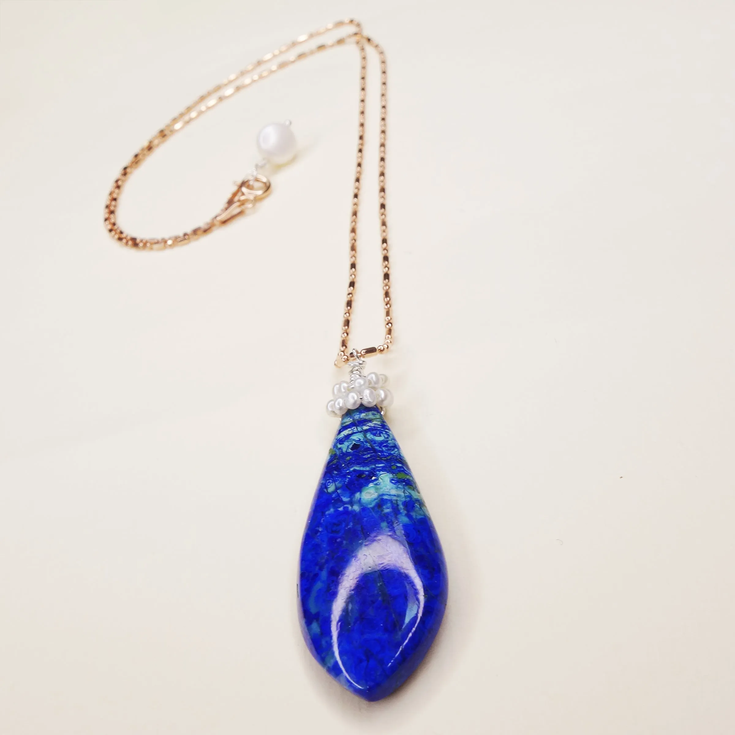She Basks in Vitamin Sea: azurite malachite, pearl, rose gold